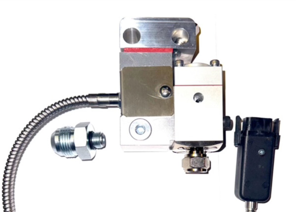 Nordson-compatible adhesive module with connector and fitting components.
